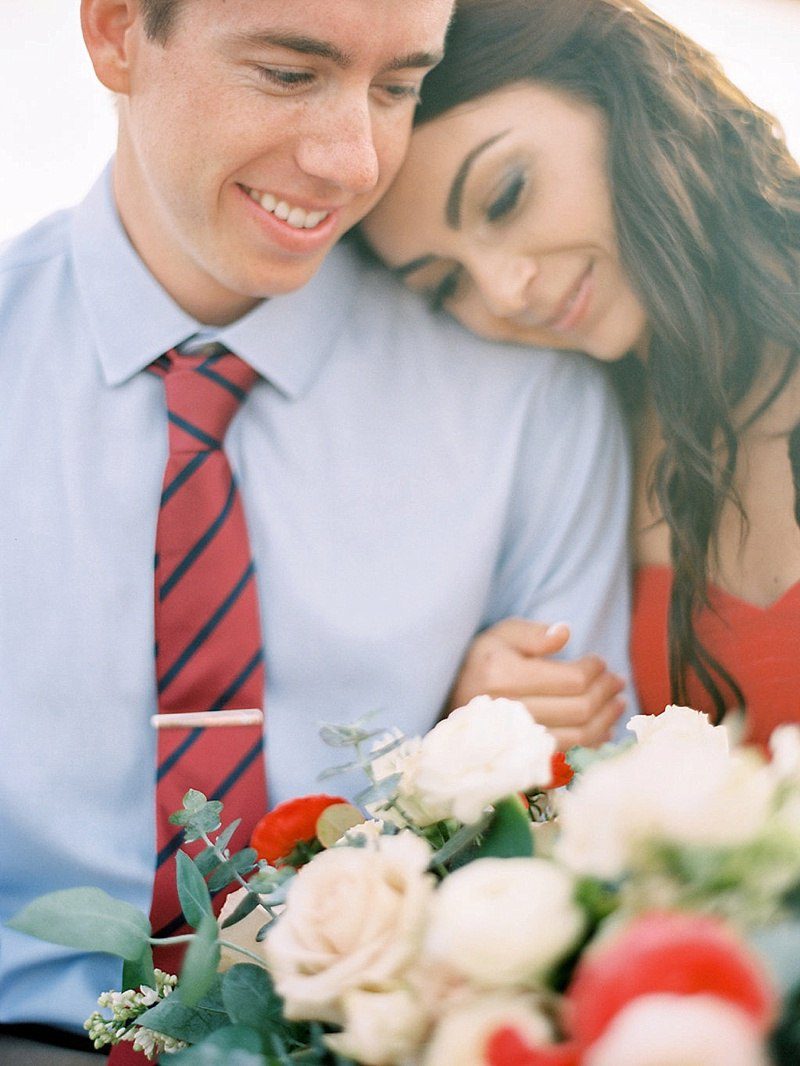 Red and blush bouquet engagement shoot at Torrey Pines. Ashley Kelemen Photography . Flowers: Plenty of Petals, Del Mar Wedding Florist
