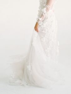 all white wedding inspiration. luna de mare photo, plenty of petals