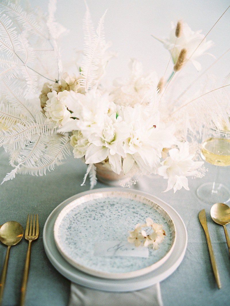 all white wedding inspiration. luna de mare photo, plenty of petals