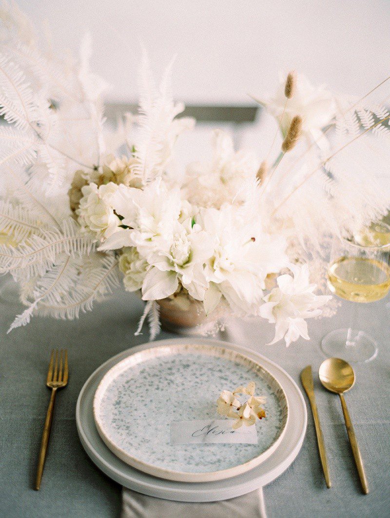 all white wedding inspiration. luna de mare photo, plenty of petals